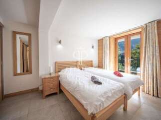 Discover a cozy bedroom with a touch of nature.