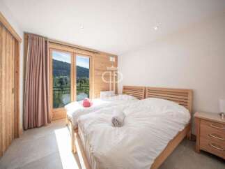 Discover a cozy bedroom with a stunning mountain view.
