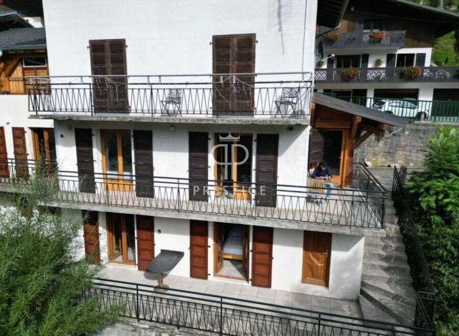 Discover a charming property with multiple balconies offering stunning views.