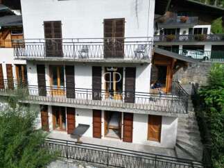 Discover a charming property with multiple balconies offering stunning views.