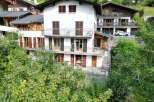 Discover a stunning property with multiple levels and charming balconies, perfect for enjoying scenic views.