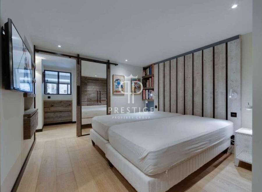 Discover luxury living in this stunning bedroom.