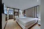Discover luxury living in this stunning bedroom.