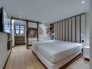 Discover luxury living in this stunning bedroom.