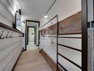 Discover a cozy haven with this stunning property, featuring a stylish bunk bed setup perfect for guests.