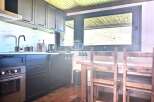 Discover a charming kitchen with a modern design.