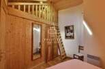 Discover the charm of this cozy wooden interior, perfect for a relaxing getaway.