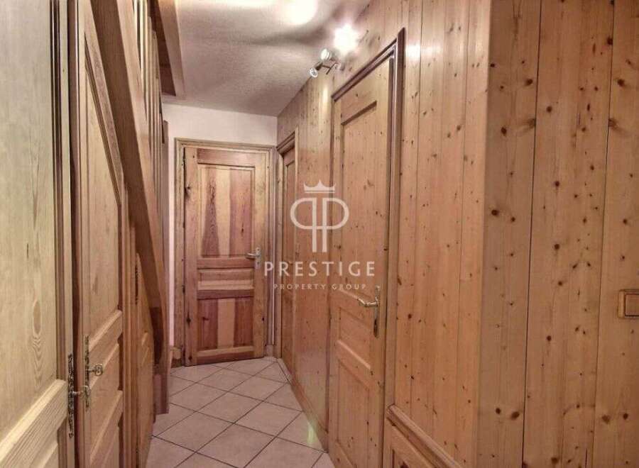 Discover the charm of this property featuring stunning wooden paneling throughout.