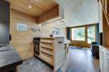 Discover the charm of this stunning property, featuring a beautifully designed kitchen with wooden accents and modern appliances.
