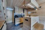 Discover the charm of this stunning wooden kitchen, a perfect blend of rustic elegance and modern design.