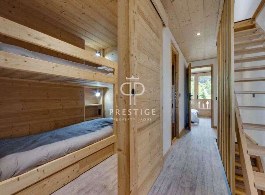 Discover the charm of this stunning property, featuring a cozy bunk bed setup perfect for family or guests.