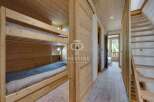 Discover the charm of this stunning property, featuring a cozy bunk bed setup perfect for family or guests.