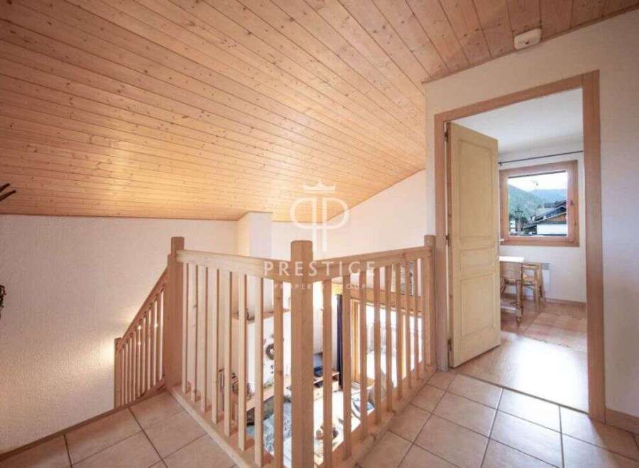 Discover the charm of this inviting property, featuring a beautifully crafted wooden ceiling that adds warmth and character.
