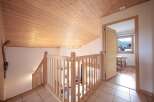 Discover the charm of this inviting property, featuring a beautifully crafted wooden ceiling that adds warmth and character.
