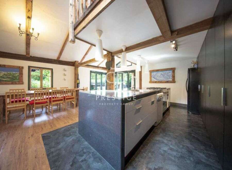Experience rustic elegance in this stunning kitchen.