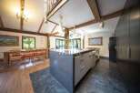 Experience rustic elegance in this stunning kitchen.