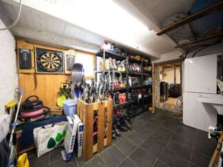 Discover the ultimate storage solution in this well-organized space.