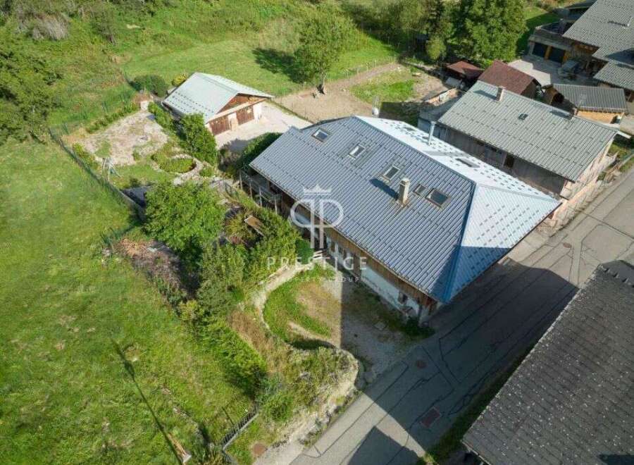 Discover a stunning property with a charming chalet-style design.