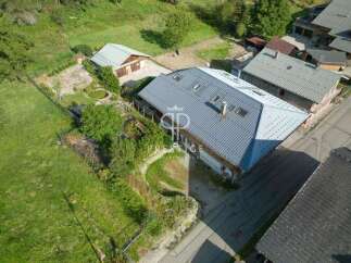 Discover a stunning property with a charming chalet-style design.