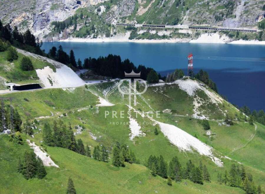Discover breathtaking mountain views and serene lake vistas from this exceptional property.
