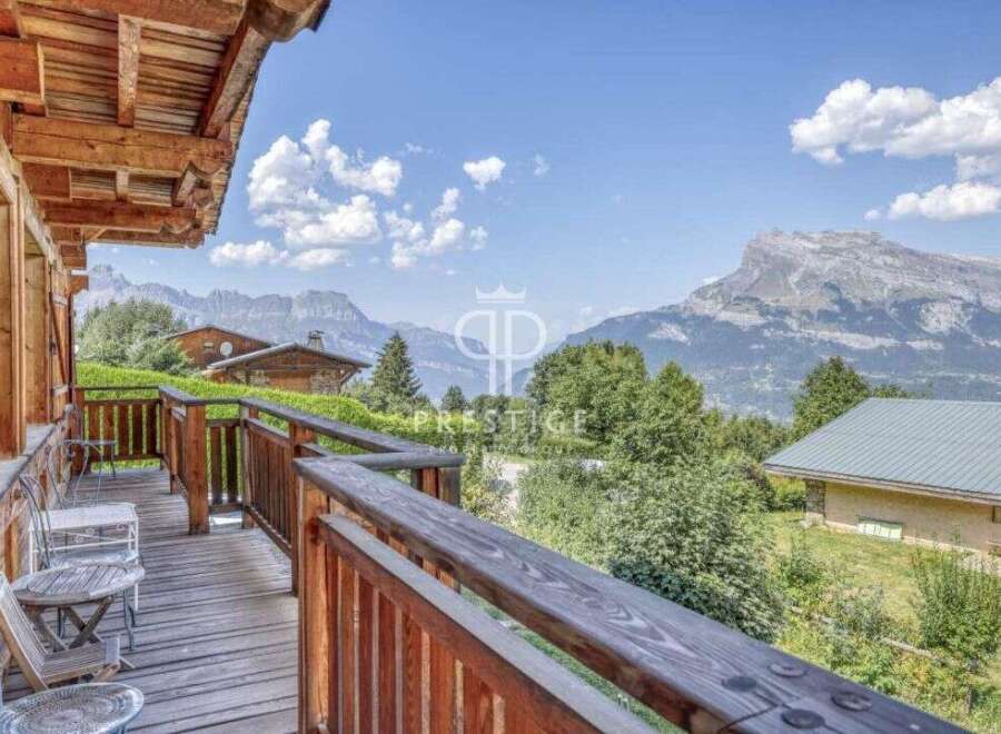 Experience breathtaking mountain views from this charming chalet.