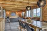 Experience rustic charm in this stunning property, featuring warm wooden interiors and a cozy ambiance.