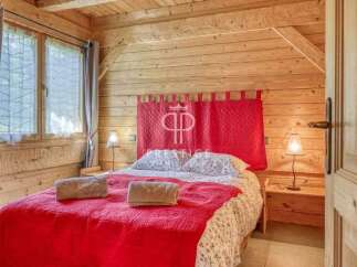 Experience rustic charm in this cozy bedroom.