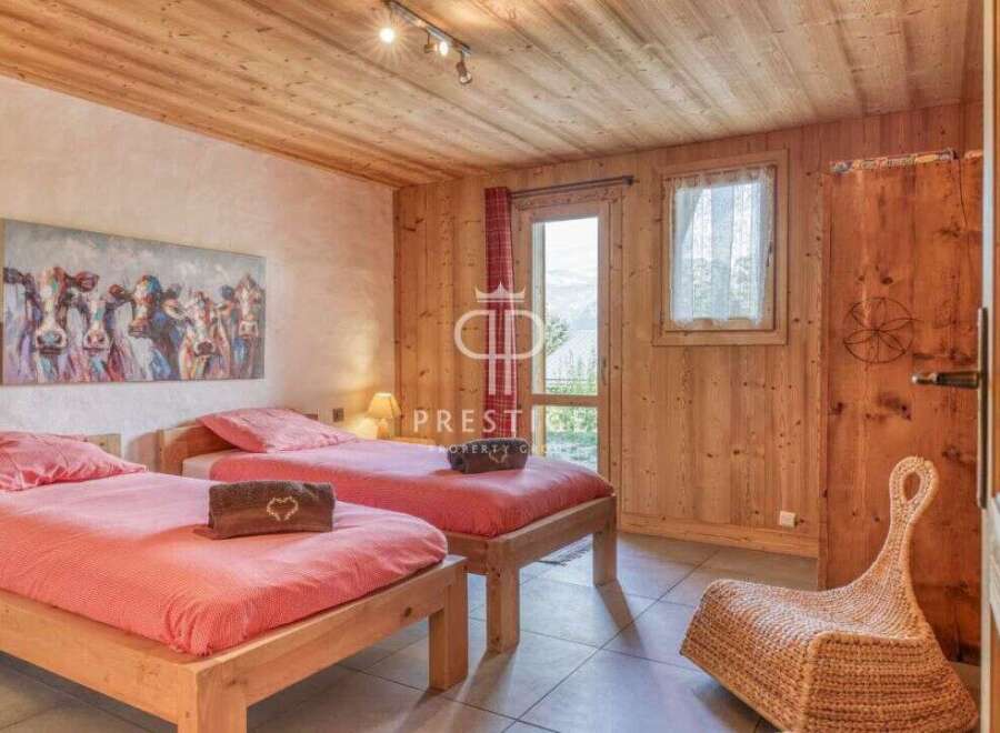 Discover a cozy bedroom with wooden accents and a charming ambiance.