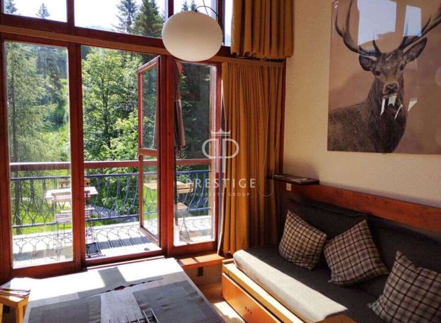 Discover a cozy retreat with stunning views! This property features a charming balcony overlooking lush greenery, perfect for morning coffee or evening relaxation.