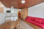 Cozy studio apartment with a well-equipped kitchenette, perfect for a comfortable stay.