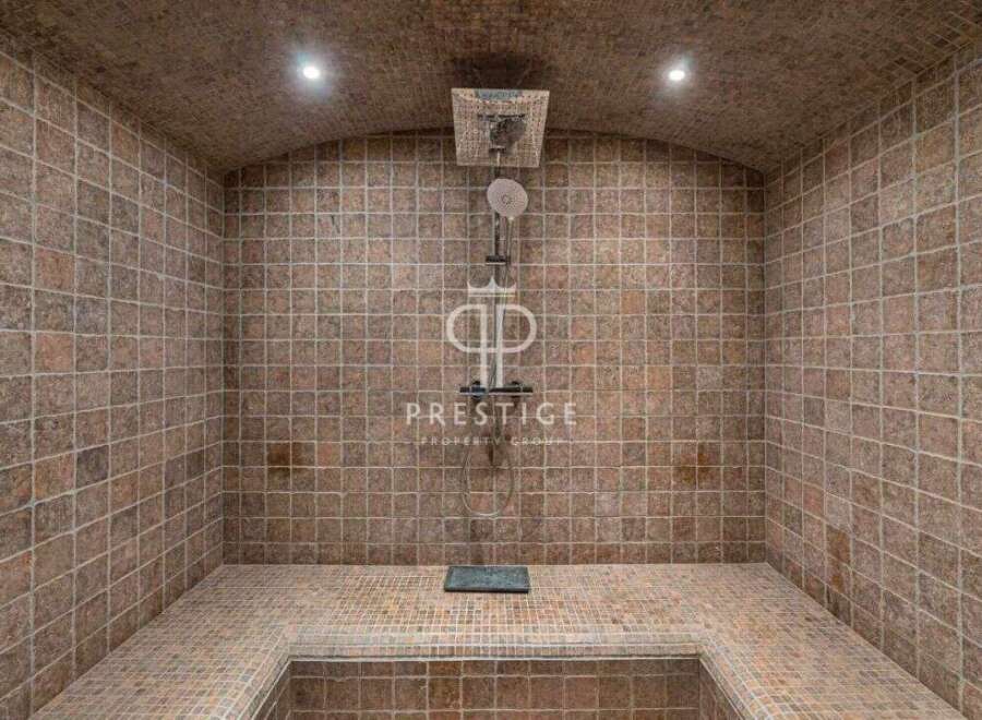 Step into luxury with this stunning property featuring a spa-like shower.
