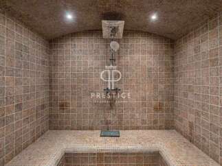 Step into luxury with this stunning property featuring a spa-like shower.