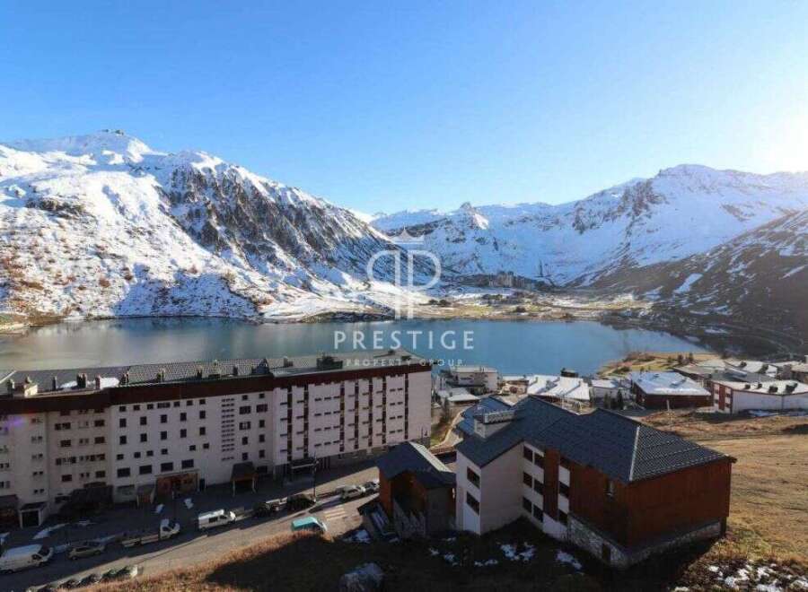 Discover breathtaking mountain views and a serene lake setting in this stunning property.