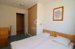 Discover a cozy bedroom with a comfortable bed, perfect for relaxation.