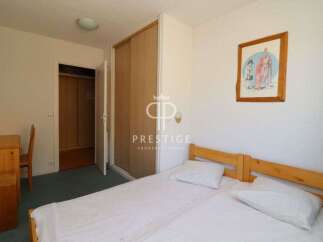 Discover a cozy bedroom with a comfortable bed, perfect for relaxation.