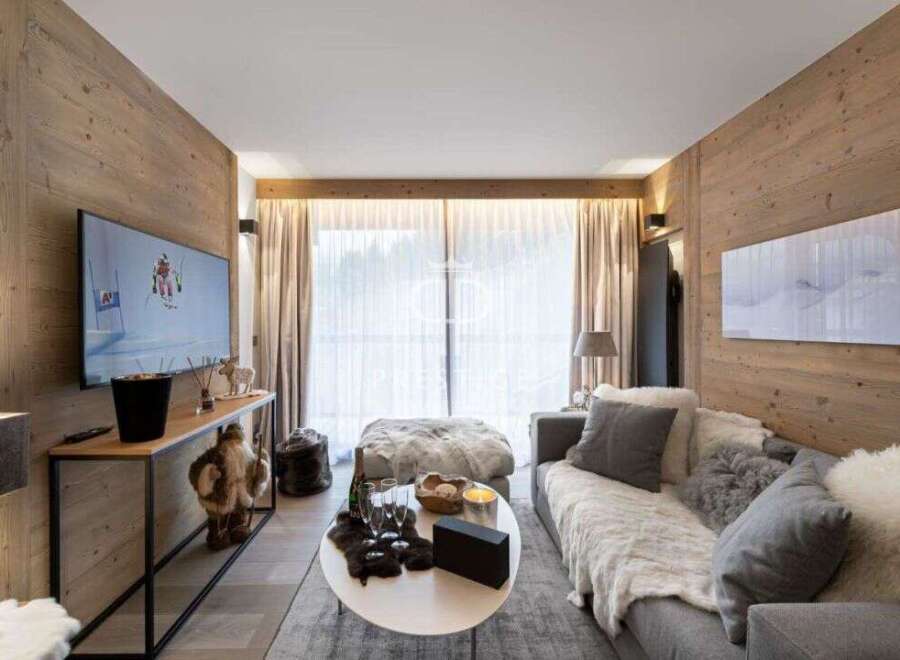 Experience luxury living in this stunning property, featuring exquisite wooden paneling and a cozy ambiance.