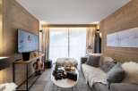 Experience luxury living in this stunning property, featuring exquisite wooden paneling and a cozy ambiance.