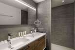 Discover modern luxury in this stunning bathroom.