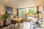 Discover a cozy living space with a touch of nature.