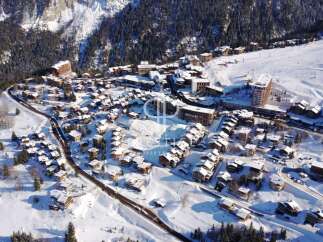 Discover a stunning winter wonderland property nestled in the heart of a picturesque ski resort.