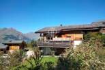 Discover a stunning chalet nestled in the heart of the mountains, offering breathtaking views and a serene escape.