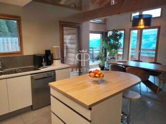 Experience luxury living in this stunning property, boasting a modern kitchen with sleek appliances and ample counter space.