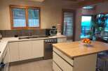 Discover modern elegance in this stunning kitchen.