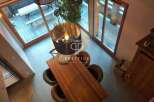 Discover a stunning property with a modern dining area, perfect for entertaining.