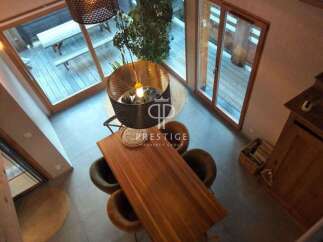 Discover a stunning property with a modern dining area, perfect for entertaining.