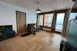 Discover a cozy living space with stunning wooden floors and a modern design.