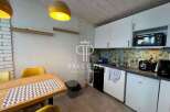 Discover this charming property featuring a well-equipped kitchen with modern appliances and stylish cabinetry.