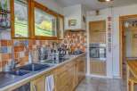Discover a charming kitchen with a rustic design.