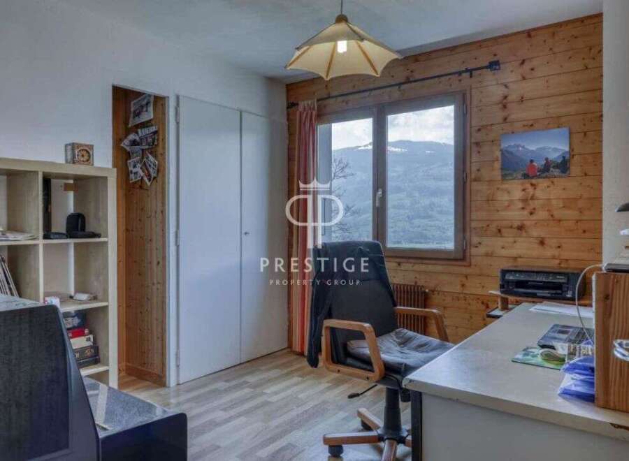Discover a cozy workspace with stunning mountain views.