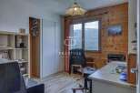 Discover a cozy workspace with stunning mountain views.